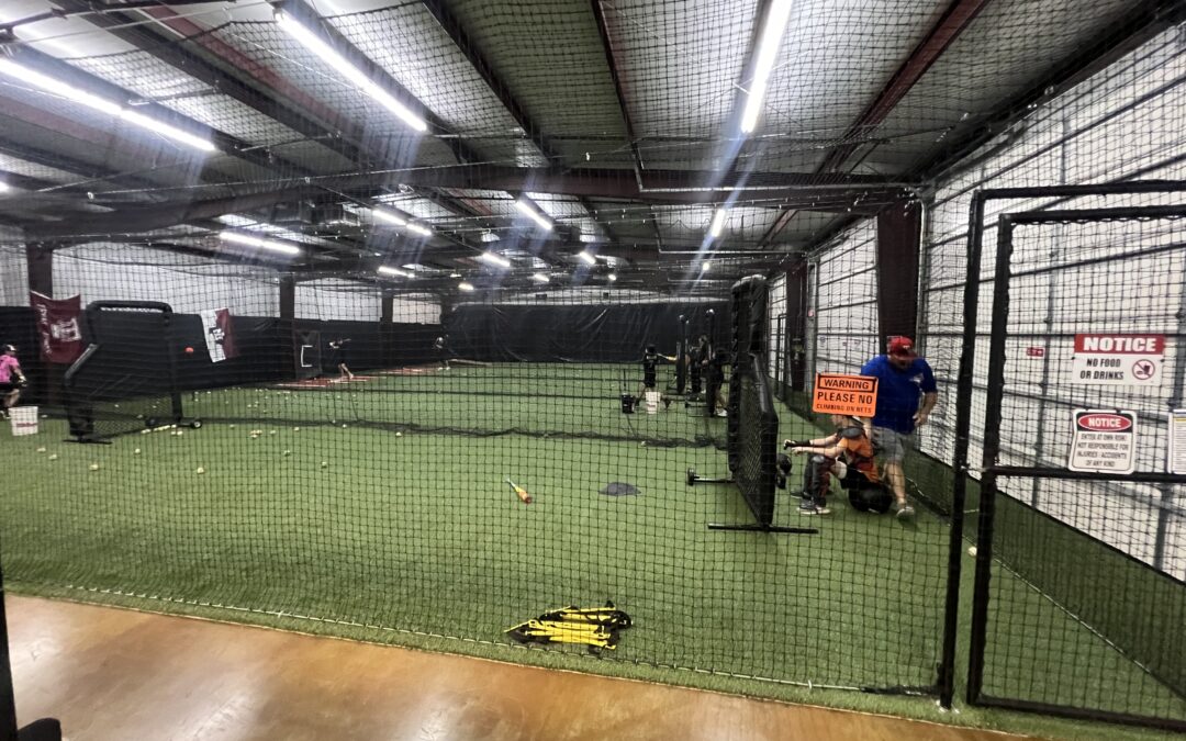 A batting cage facility is a dedicated space designed for baseball and softball players to practice their hitting skills